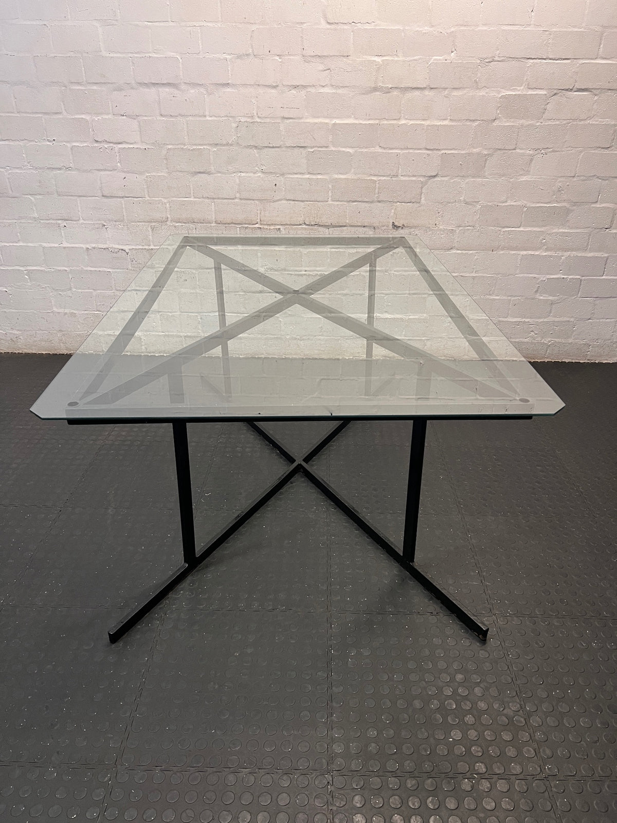 Black Metal and Glass Dining Table with X-Base — Rust Markings on Metal Base – side view