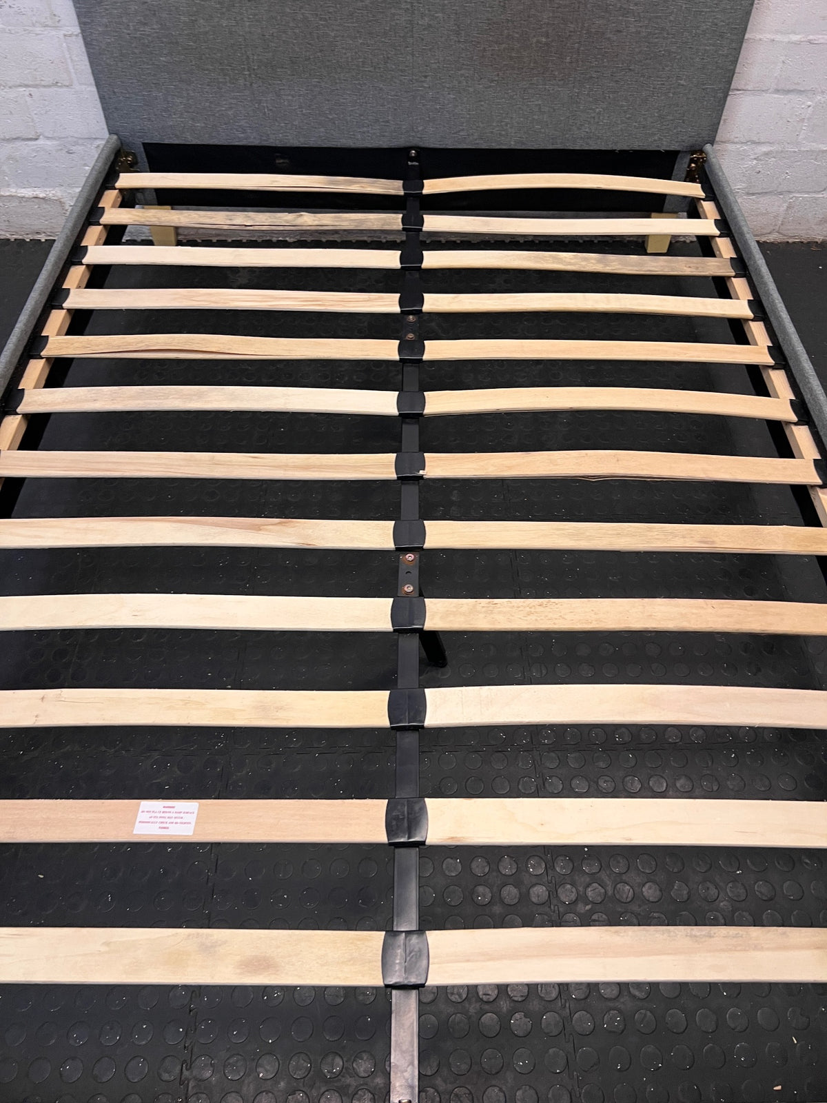 Decofurn Grey Upholstered Double Bed Frame — Torn Mattress and Slatted Base – condition detail