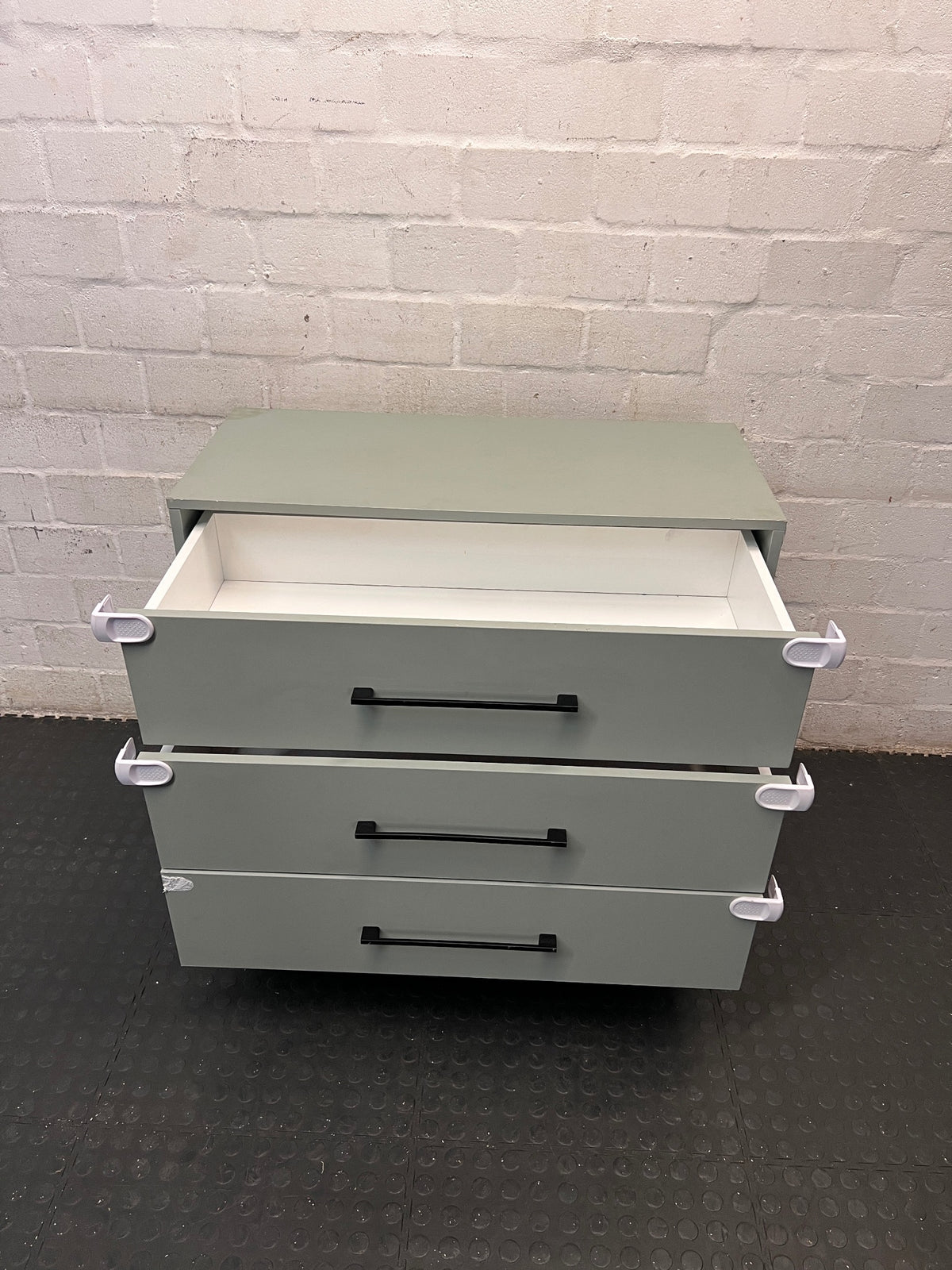 Sage Green 3-Drawer Chest with Black Metal Legs — Good Condition with Safety Locks Attached – side view