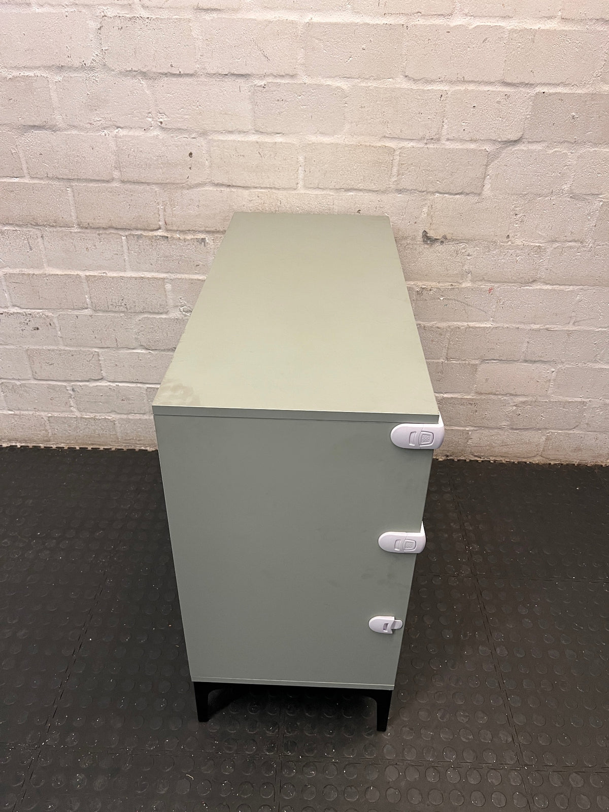 Sage Green 3-Drawer Chest with Black Metal Legs — Good Condition with Safety Locks Attached – top view