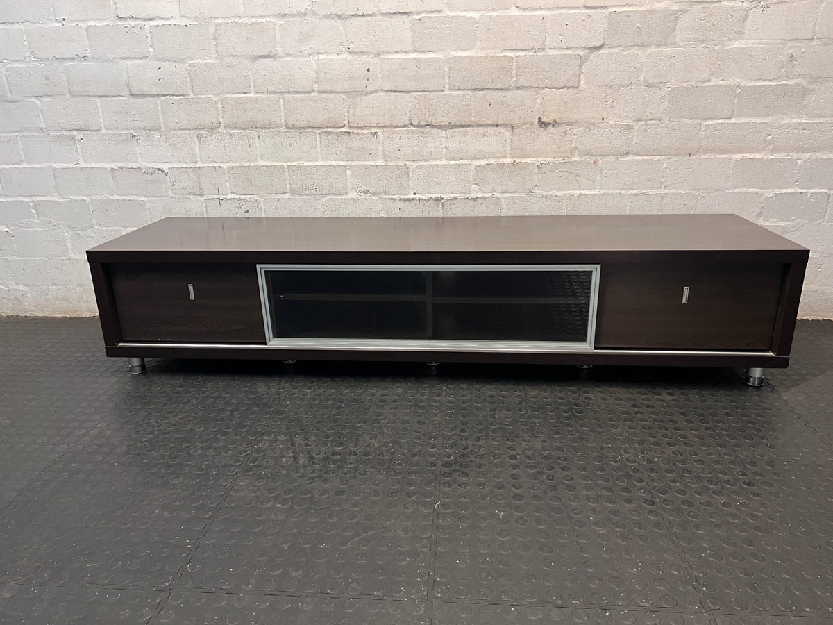 Wide Dark Brown TV Unit with Glass Centre Panel — Fair Used Condition – main front view