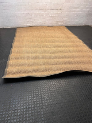 Large Woven Brown Area Rug with Fabric Border — Fair Condition with Visible Wear – main front view