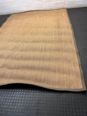 Large Woven Brown Area Rug with Fabric Border — Fair Condition with Visible Wear – width measurement