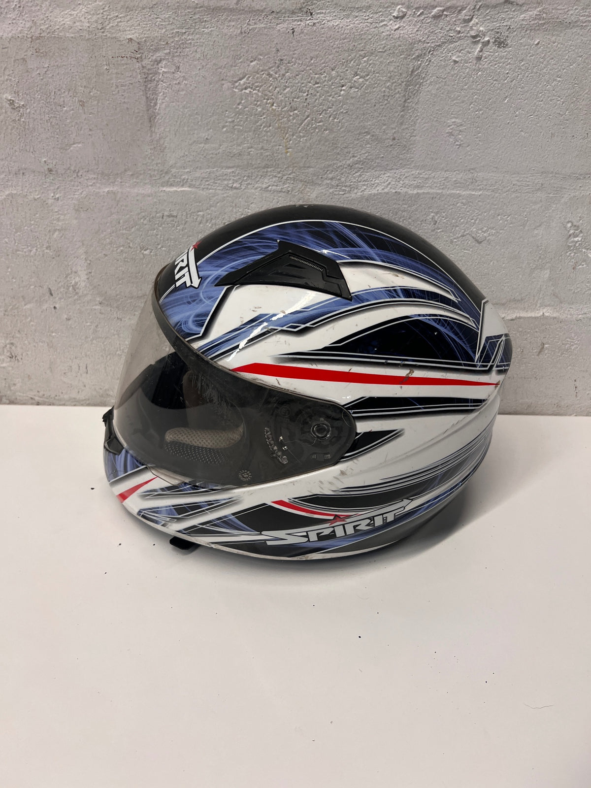 Spirit Blue and Black Graphic Motorbike Helmet — Used; Fair Condition – condition detail