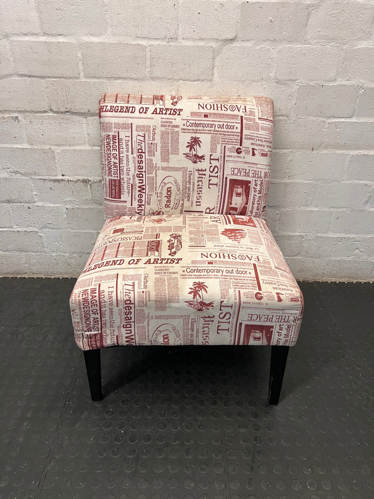 Newspaper Print Armless Accent Chair — Fair Used Condition – main front view
