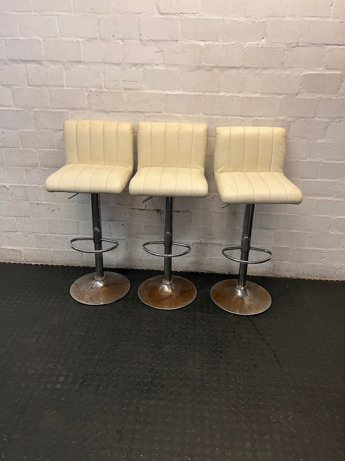 White Faux Leather Pedestal Bar Stool — Rust Spots on Bases and Worn Upholstery – side view