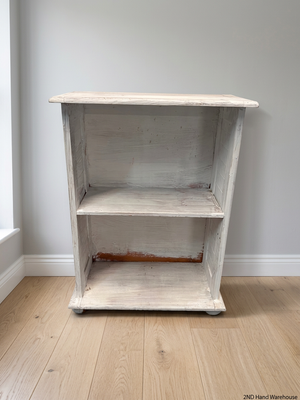 Compact White Two-Tier Bookshelf — Well Used with Significant Paint Wear – styled product image