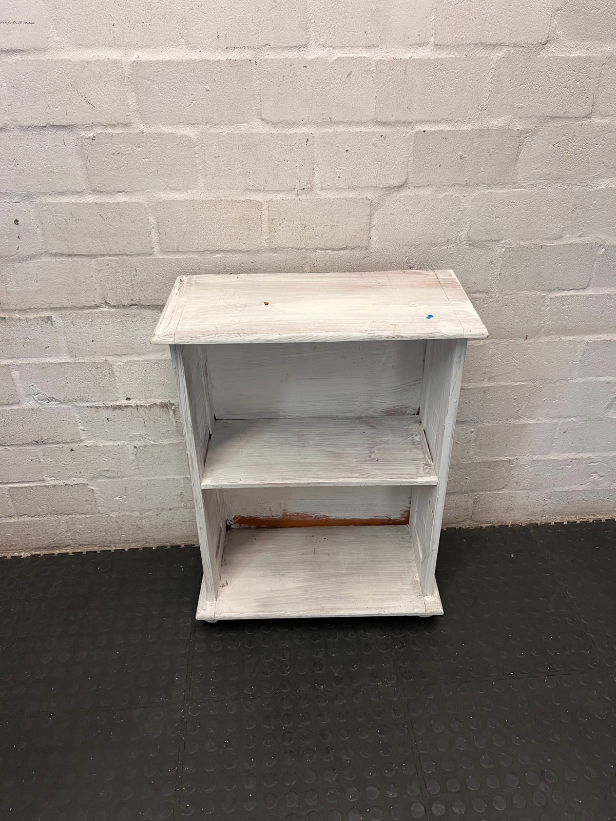 Compact White Two-Tier Bookshelf — Well Used with Significant Paint Wear – top view