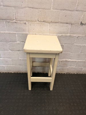 Off-White Wooden Square Bar Stool — Well Used with Visible Surface Wear – back view
