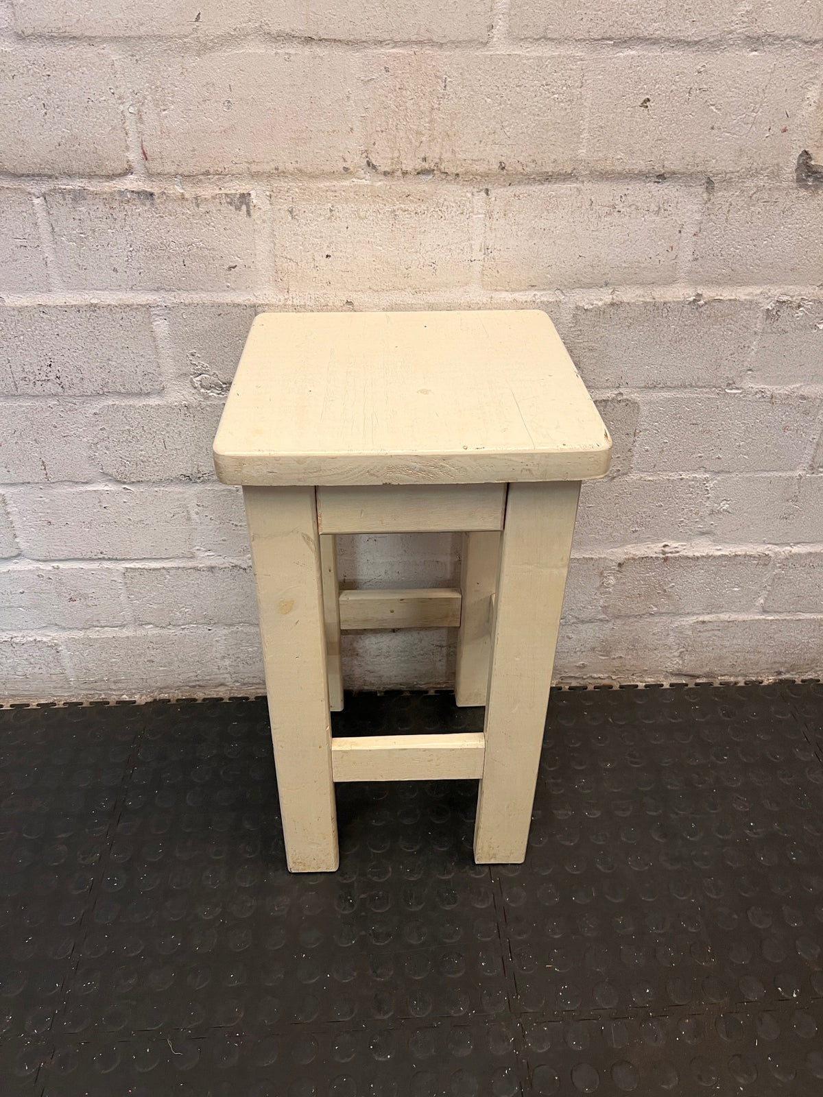 Off-White Wooden Square Bar Stool — Well Used with Visible Surface Wear – condition detail