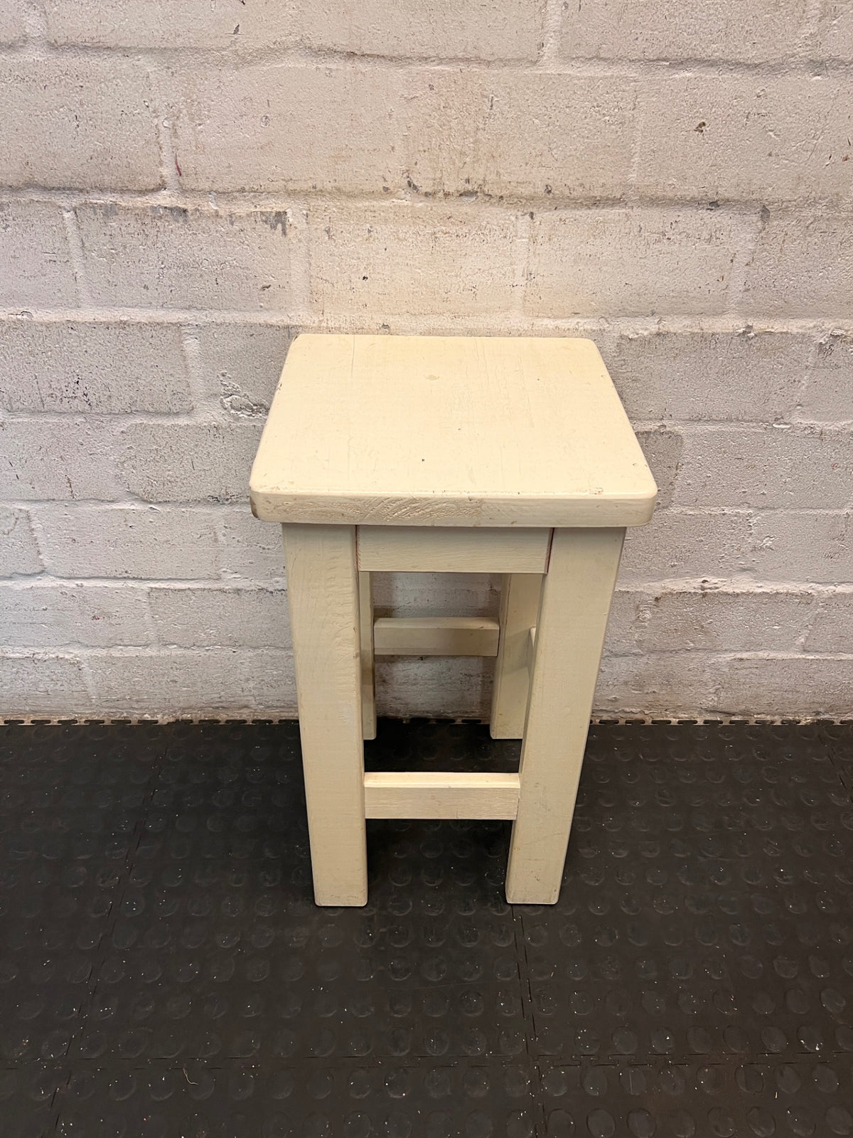 Off-White Wooden Square Bar Stool — Well Used with Visible Surface Wear – top view