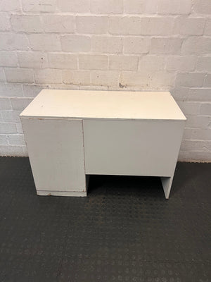 Compact White Office Desk with Right-Hand Pedestal — Visible Wear and Structural Damage – back view