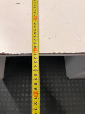 Compact White Office Desk with Right-Hand Pedestal — Visible Wear and Structural Damage – depth measurement