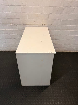 Compact White Office Desk with Right-Hand Pedestal — Visible Wear and Structural Damage – top view