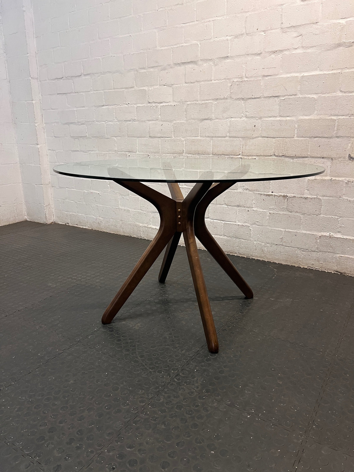 @home Round Glass Top Dining Table with Wood Base — Minor Scratches on Leg and Missing Bolt Cover – condition detail