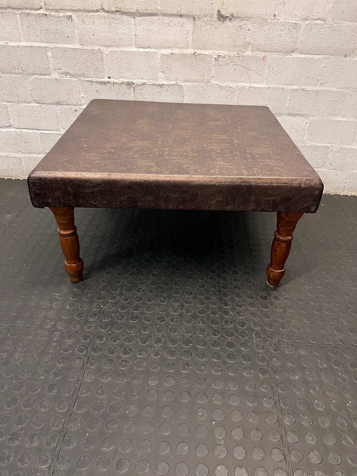 Brown Upholstered Square Coffee Table with Turned Legs — Well Used Condition – main front view