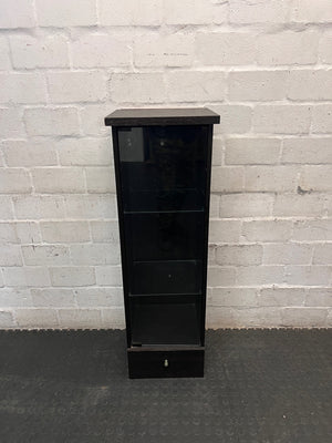 Black Slim Display Cabinet with Glass Door and Drawer — Well Used with Visible Wear – main front view