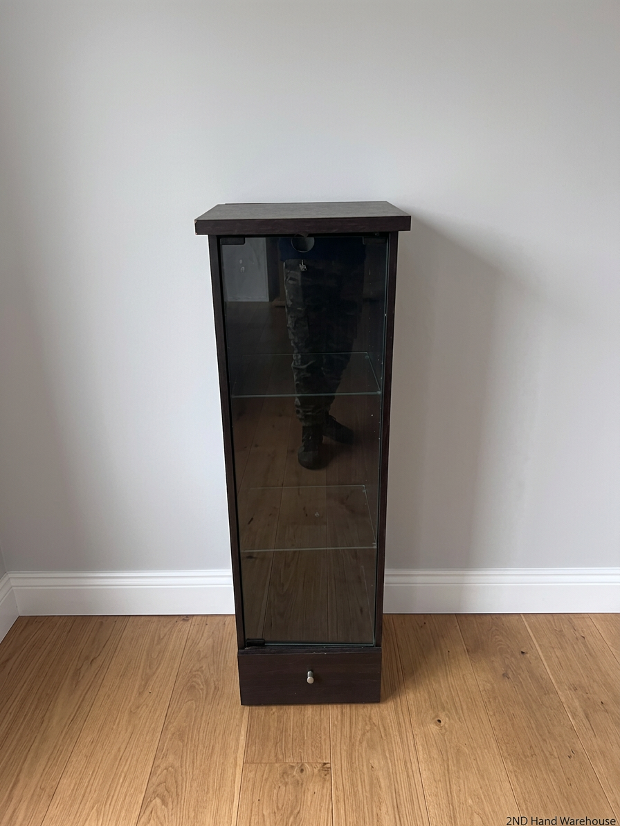 Black Slim Display Cabinet with Glass Door and Drawer — Well Used with Visible Wear – styled product image