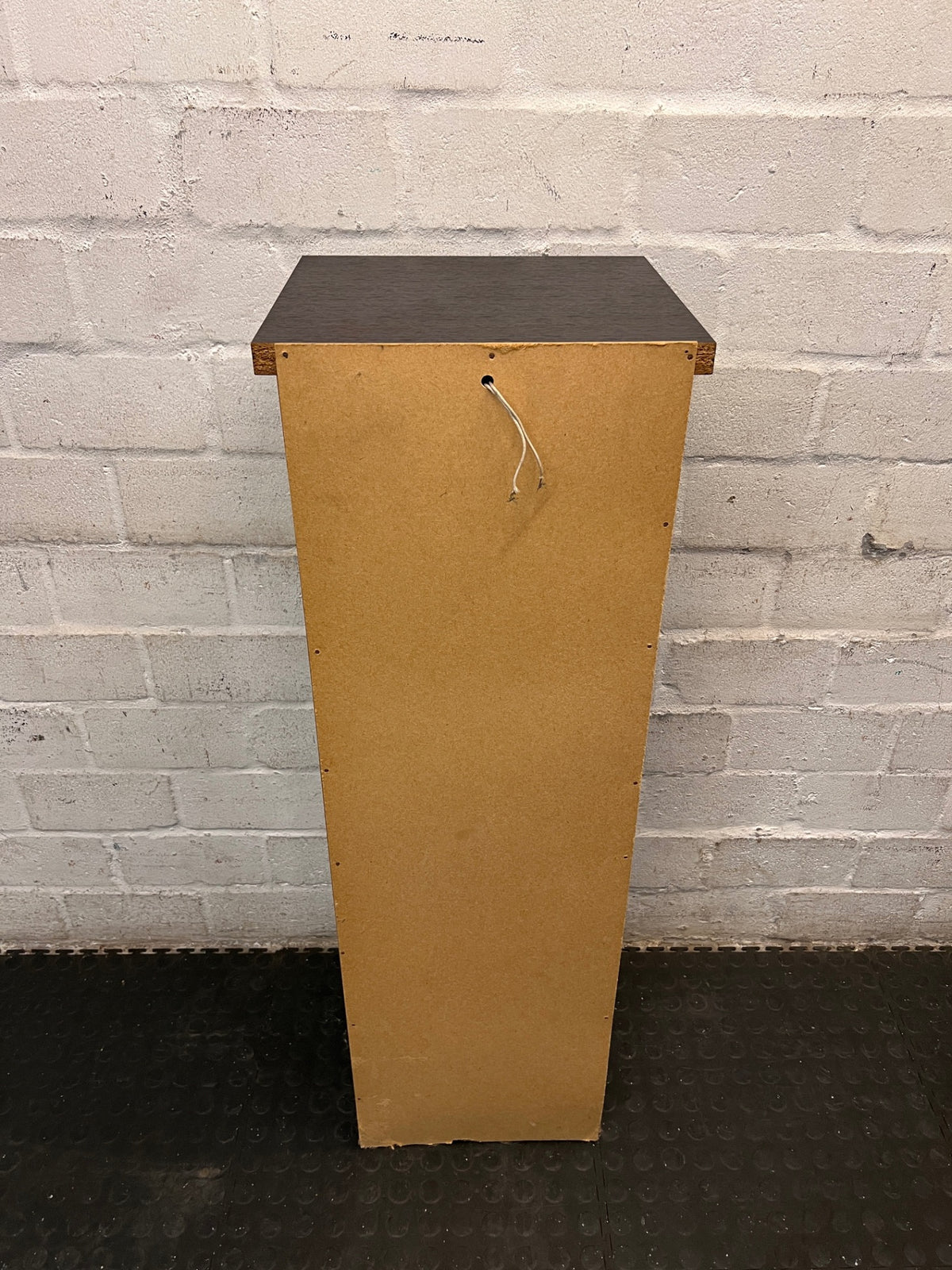 Black Slim Display Cabinet with Glass Door and Drawer — Well Used with Visible Wear – top view