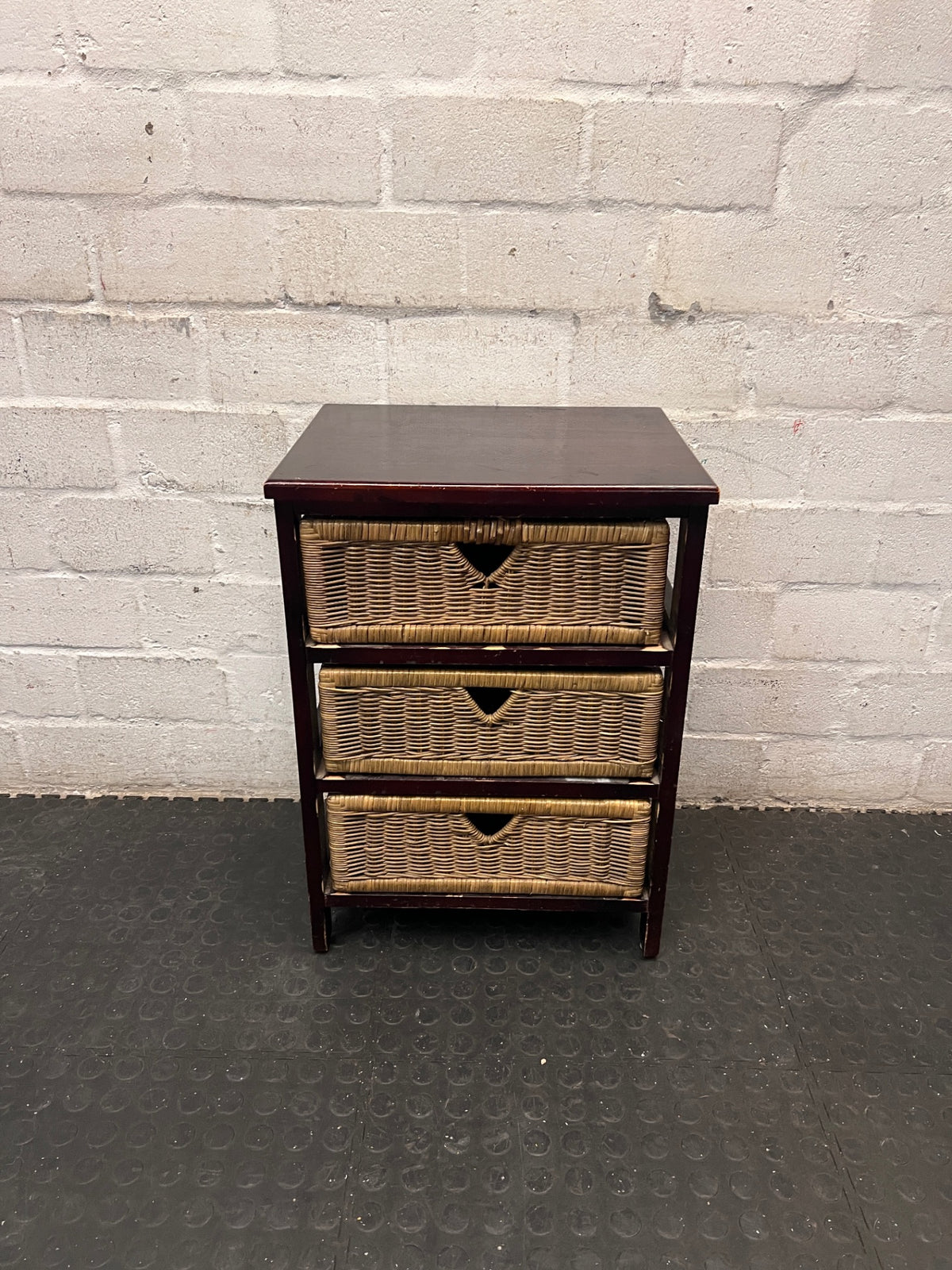 Dark Wood Bedside Table with Woven Wicker Drawers — Well Used with Visible Surface Wear – main front view