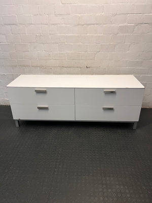 White Four-Drawer TV Unit with Metal Handles — Minor Bump Damage on Front Corners – main front view