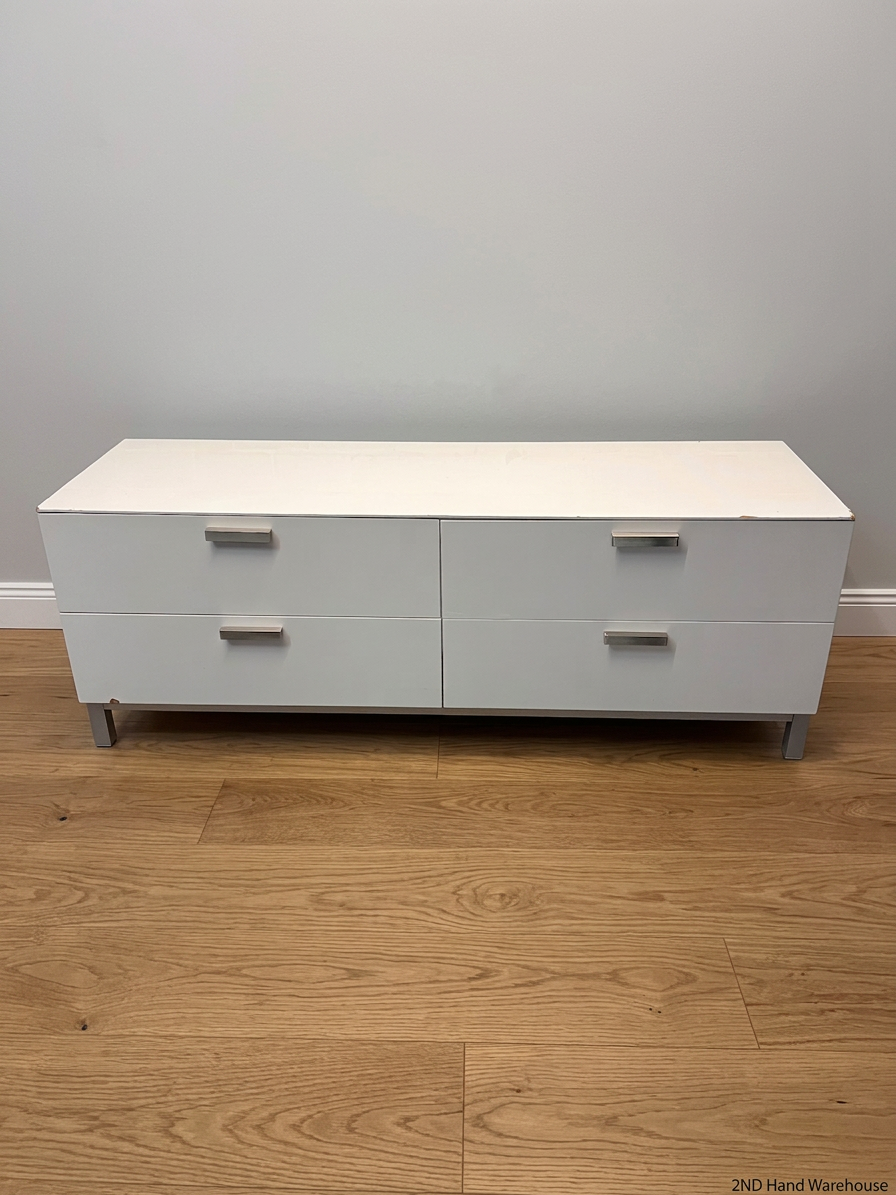 White Four-Drawer TV Unit with Metal Handles — Minor Bump Damage on Front Corners – styled product image