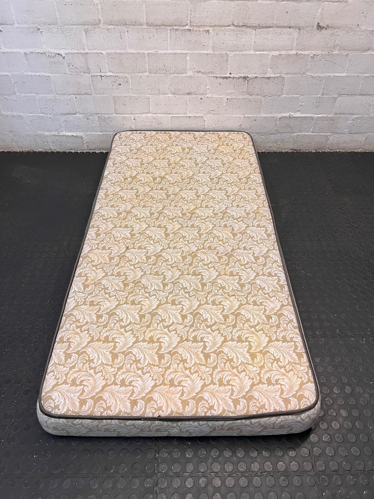 Single Foam Mattress with Floral Damask Pattern — Well Used Condition – main front view