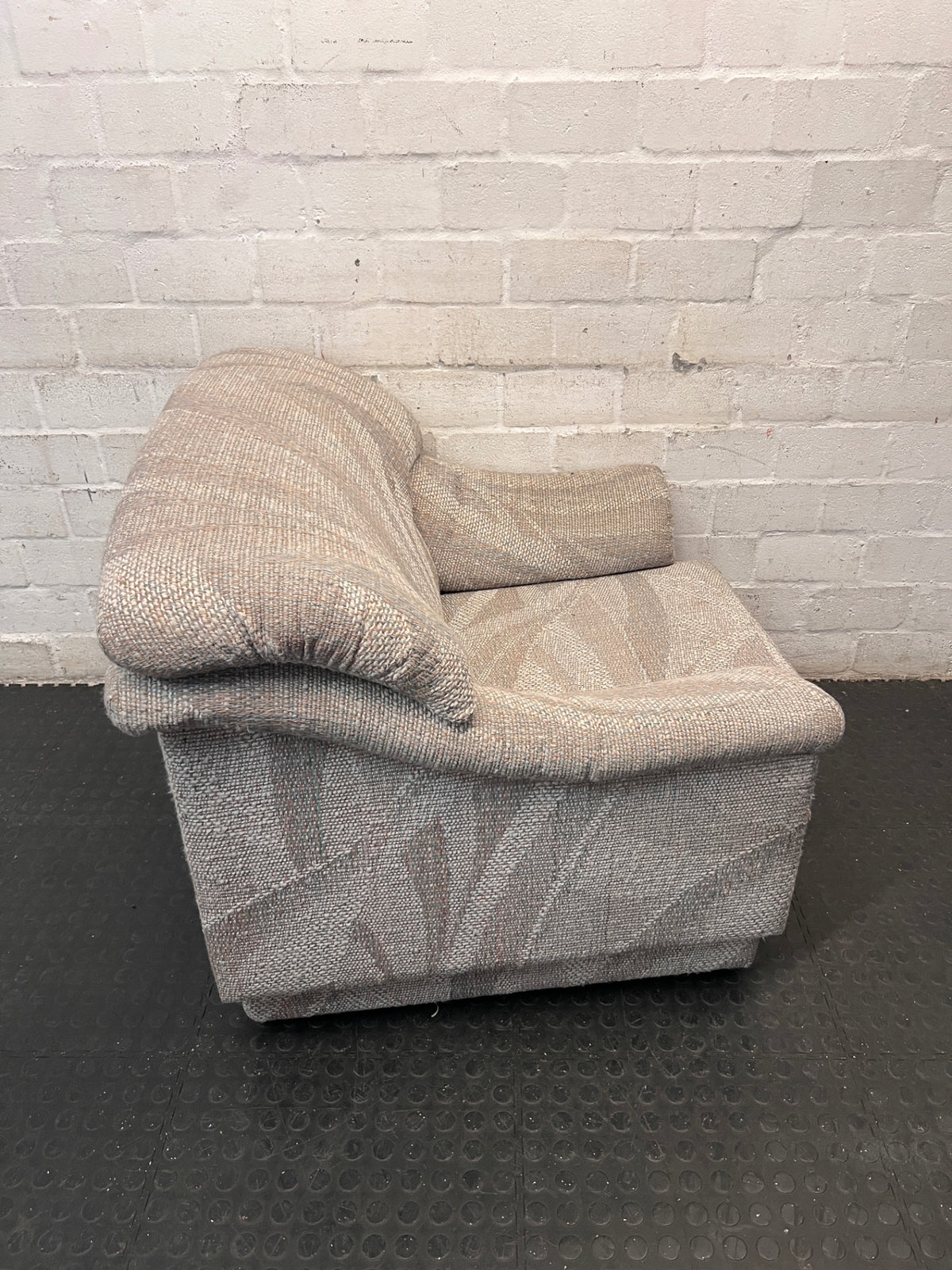 Patterned Fabric Single Seater Couch – back view