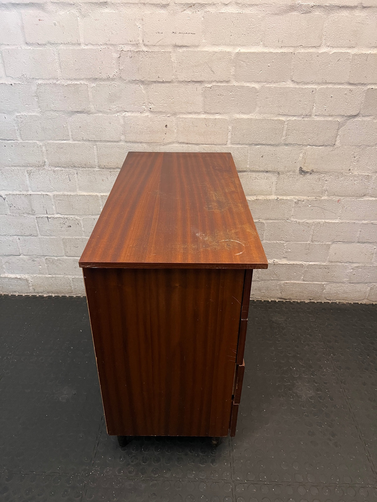 Mid-Century Style Four Drawer Chest in Brown Finish — Chipped Surfaces and Missing Handles – top view