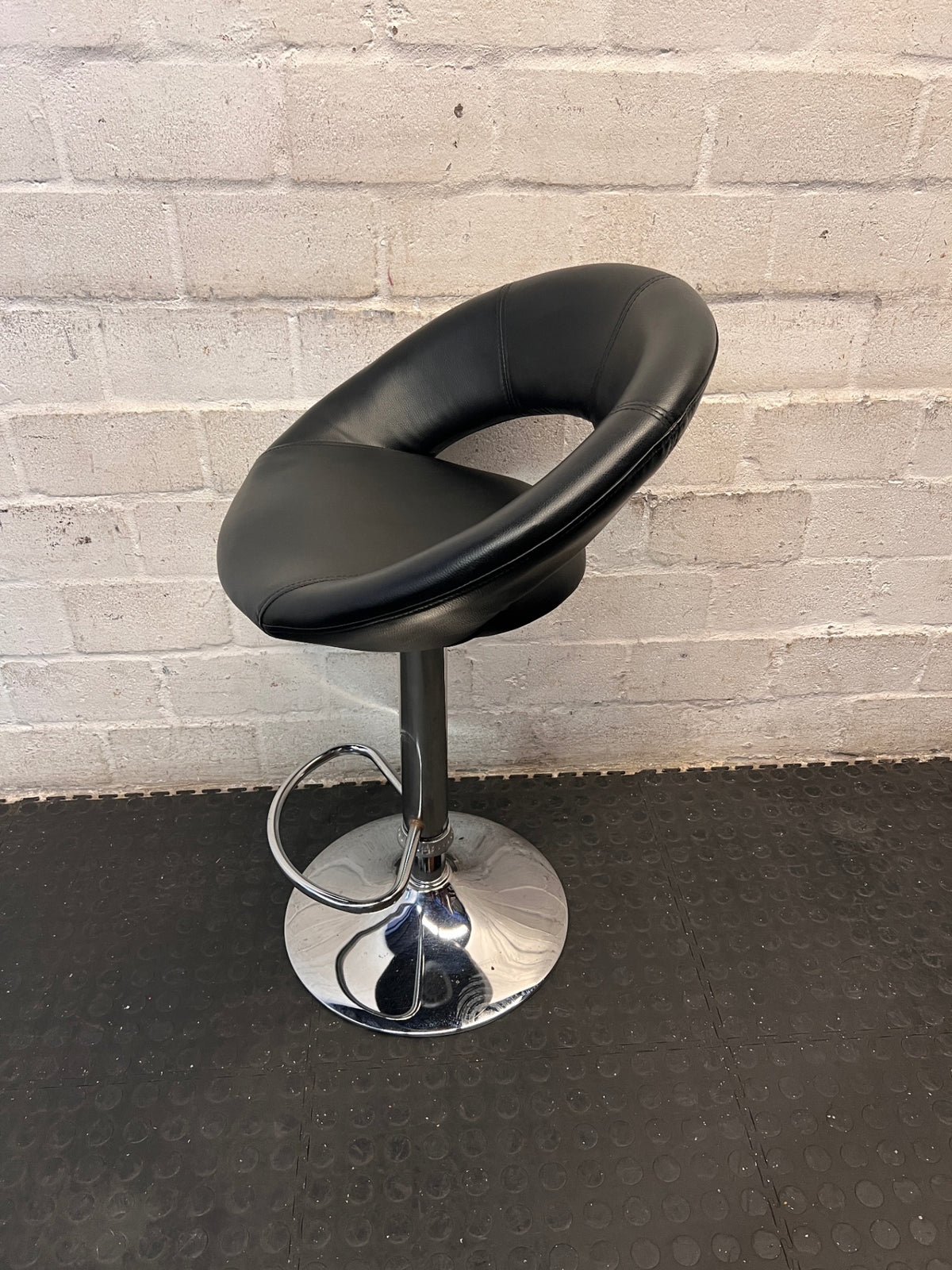 Black Faux Leather Swivel Bar Stool with Chrome Base — Good Working Order – side view
