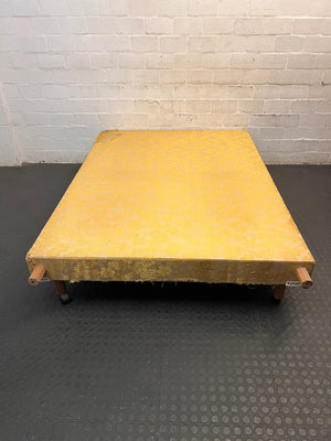Vintage Floral Fabric Double Bed Base with Wooden Legs — Damaged Upholstery and Frayed Edges – top view