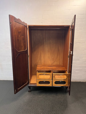 Classic Dark Wood Armoire with Scalloped Top — Well Used Wardrobe with Visible Wear – side view