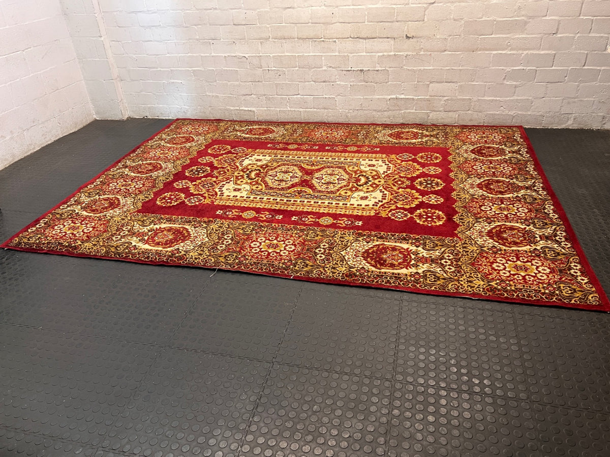 Red Persian Style Ornamental Area Rug — Fair Condition with General Wear – side view