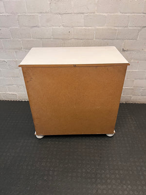 White Wooden Chest of Drawers with Bun Feet — Visible Paint Chips; Working Order – back view
