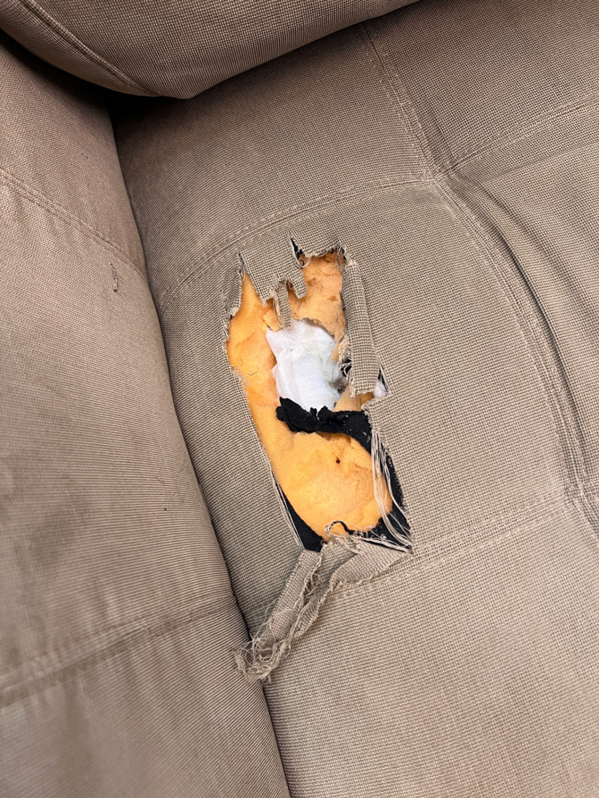 Large Brown L-Shape Sectional Couch with Tufted Detail — Damaged Underneath with Corner Tears and Stains – condition detail