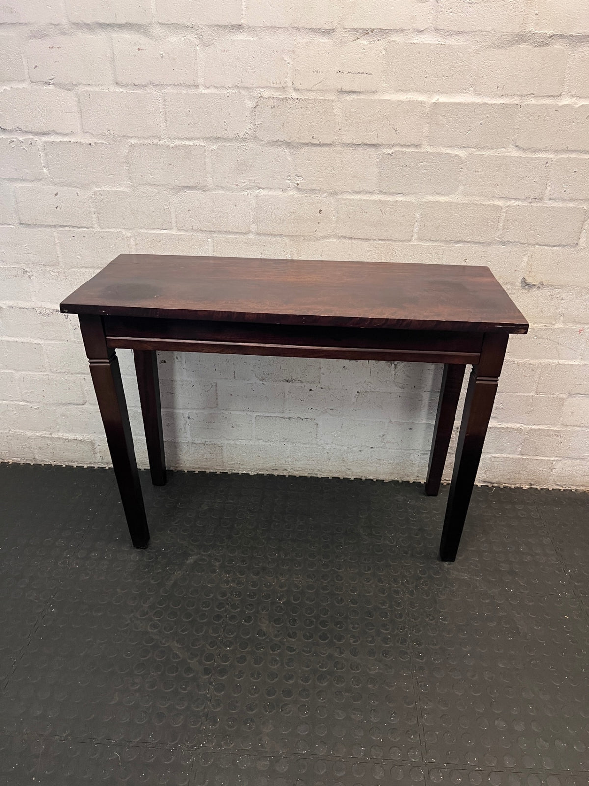 Dark Brown Wooden Console Table with Drawer — Fair Condition with Visible Wear – back view