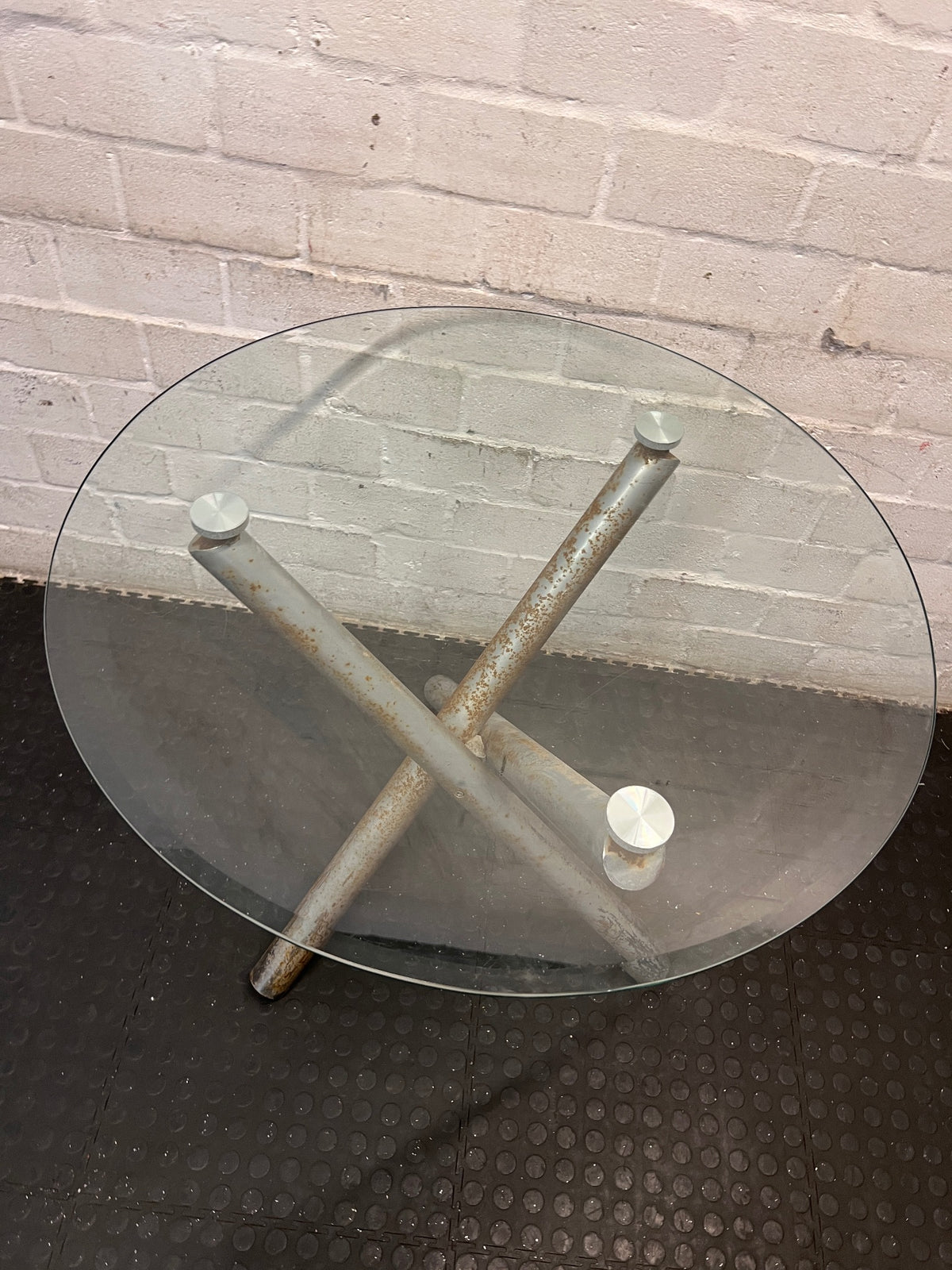Round Glass Top Table with Metal Tripod Base – condition detail