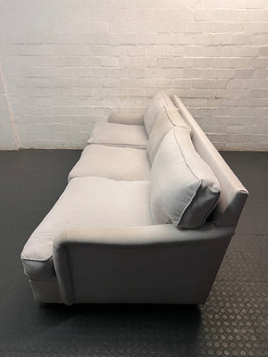 Light Grey 3 Seater Couch with Feather Inner — Visible Wear and Minor Stains – side view
