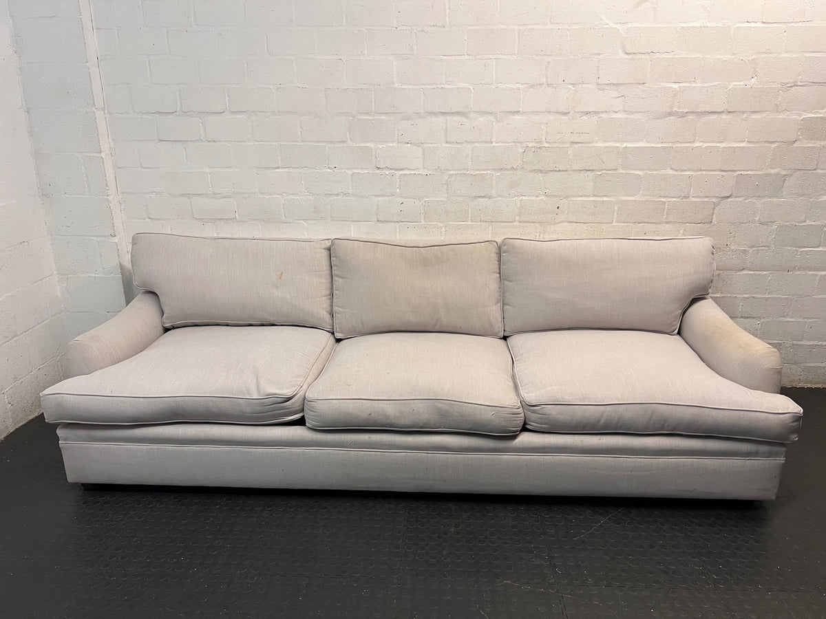 Light Grey 3 Seater Couch with Feather Inner — Visible Wear and Minor Stains – top view