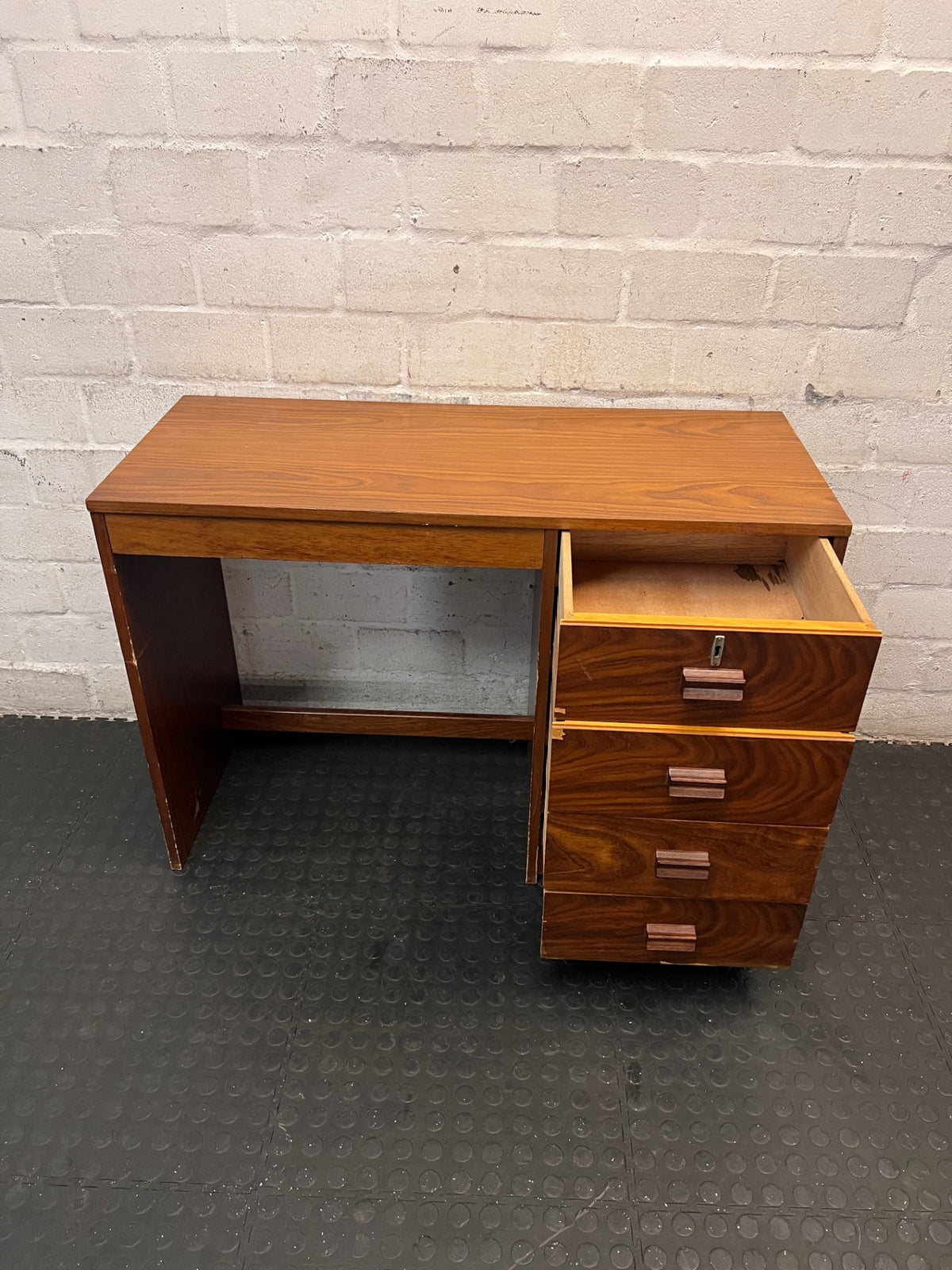 Wooden Office Desk with 4 Drawers — Chipped Veneer and Surface Wear – side view