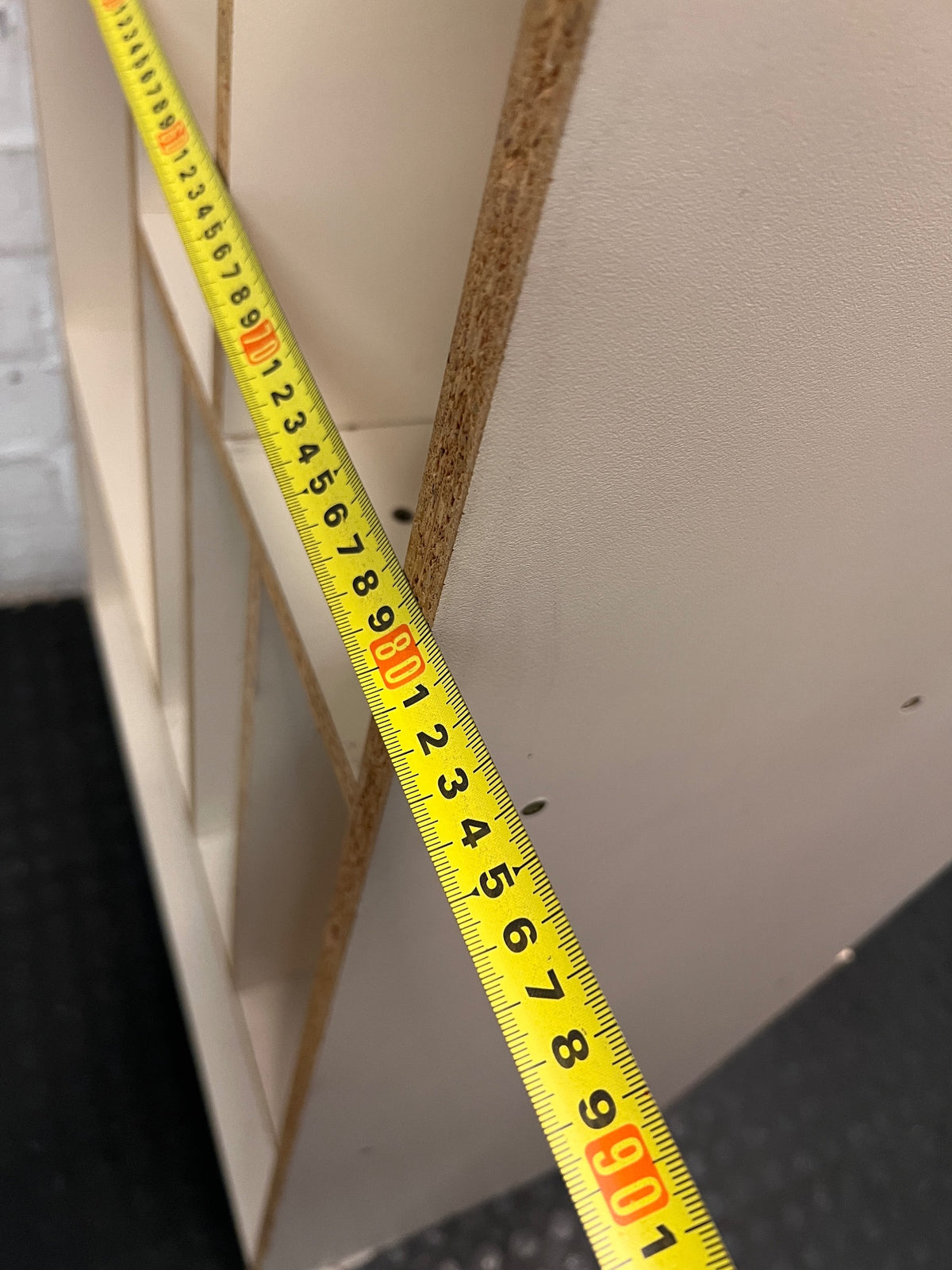 Asymmetrical Shelving Unit with Bottom Cupboard – depth measurement