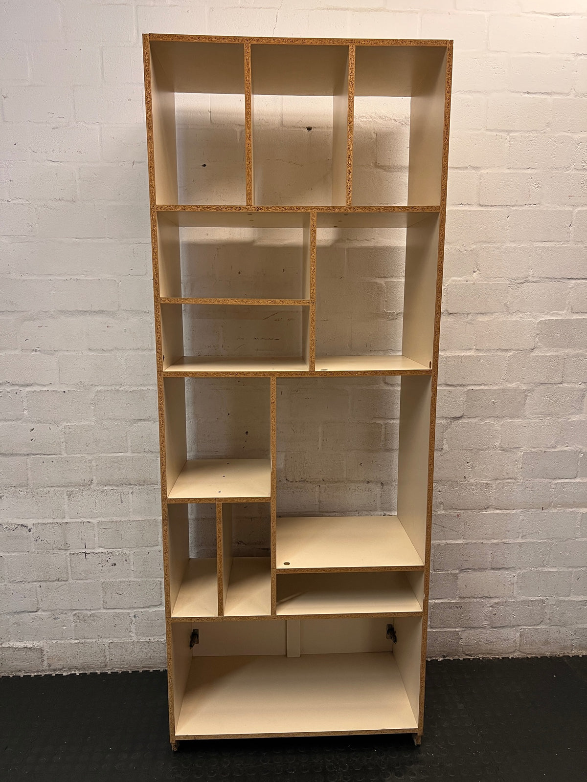 Tall Asymmetrical Shelving Wall Unit with Bottom Cupboard — Fair Used Condition – back view