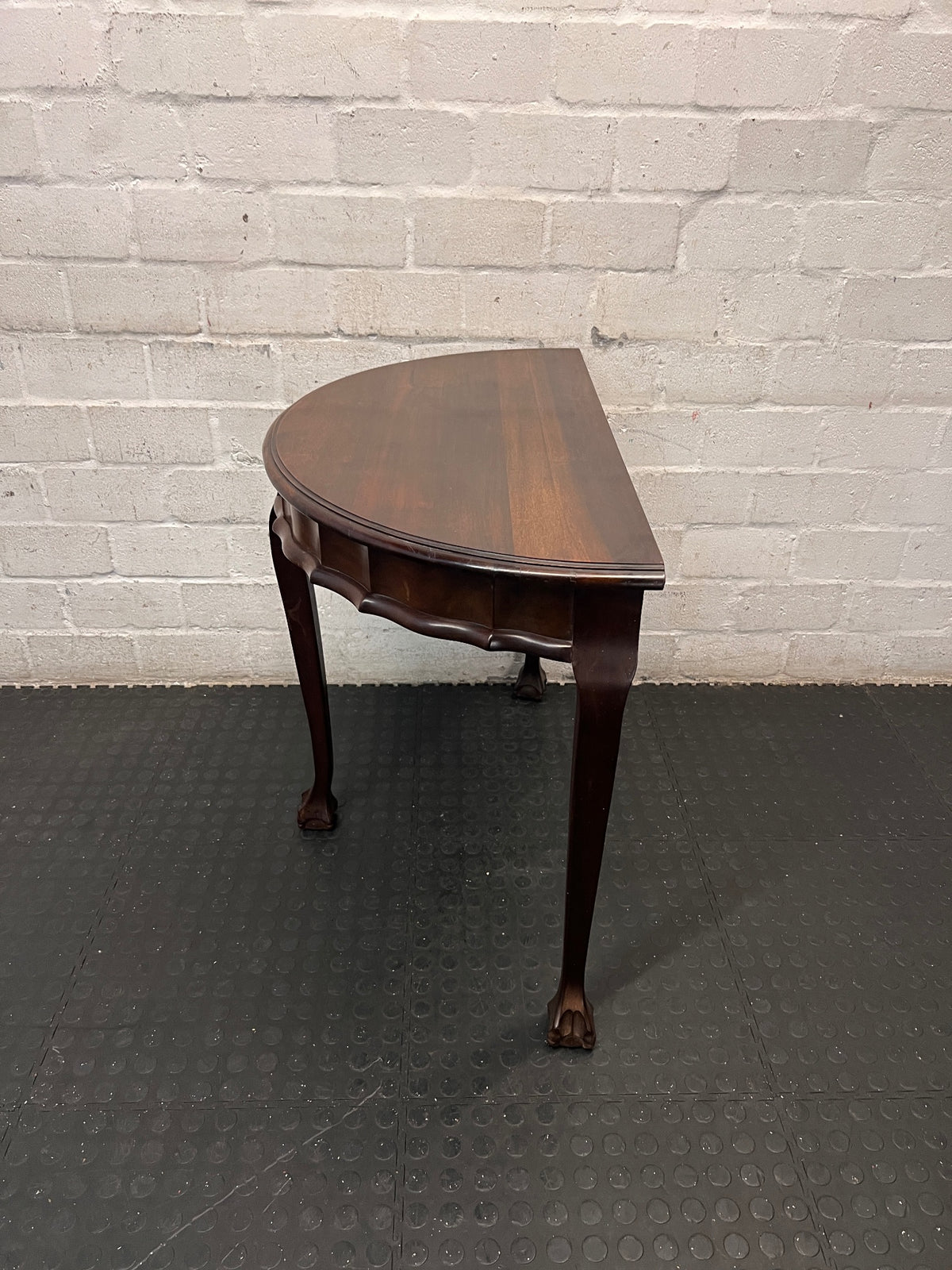 Dark Brown Half-Moon Console Table with Claw Feet — Fair Condition with Visible Surface Wear – side view