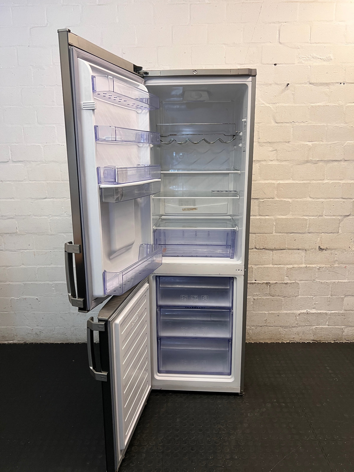 Defy Silver Fridge Freezer with Water Dispenser — Good Working Order – side view
