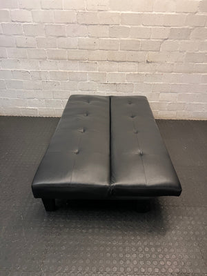 Black Tufted Leather-Look Sleeper Couch — Good Working Order – condition detail