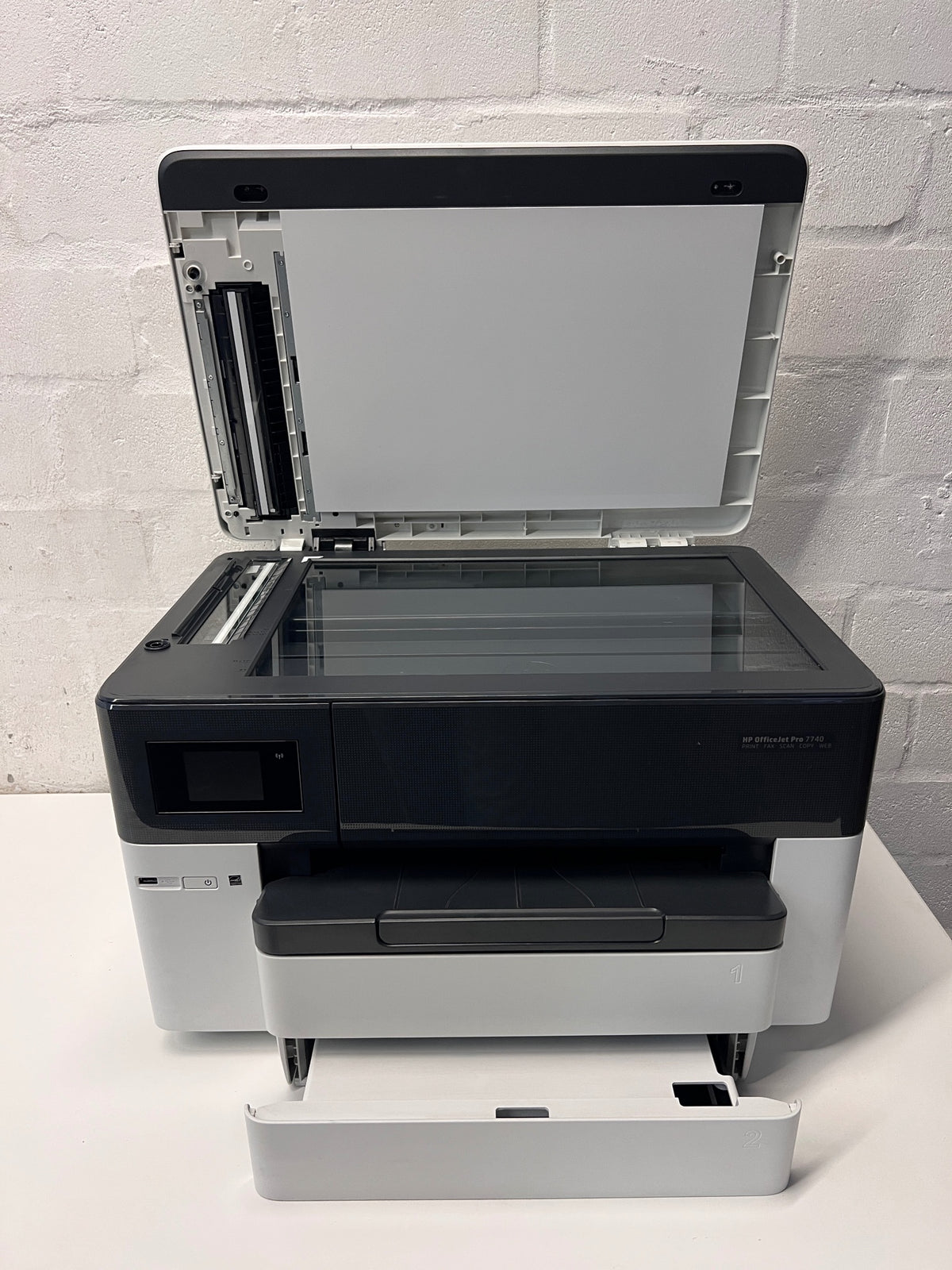 HP OfficeJet Pro 7740 All-in-One Wide Format Printer — Prints with Small Lines; Low Ink – side view