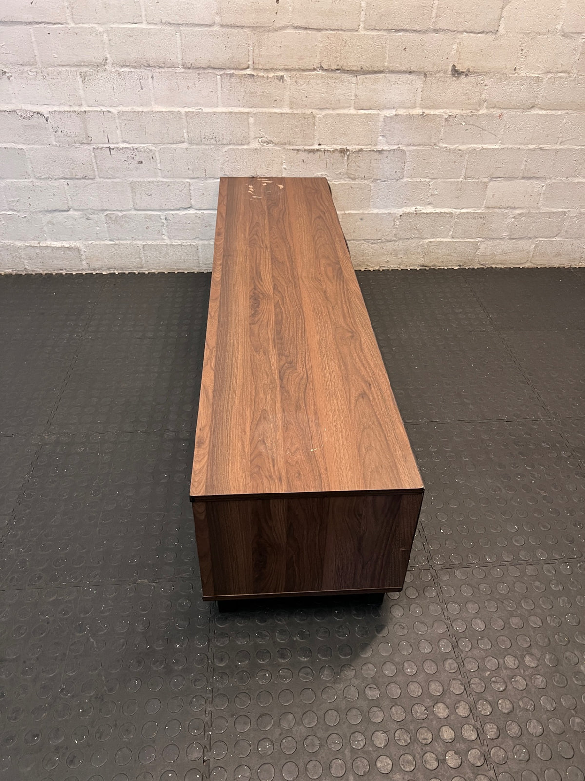 Brown and Black Low-Profile TV Unit — Surface Marks and Peeling on Top – condition detail