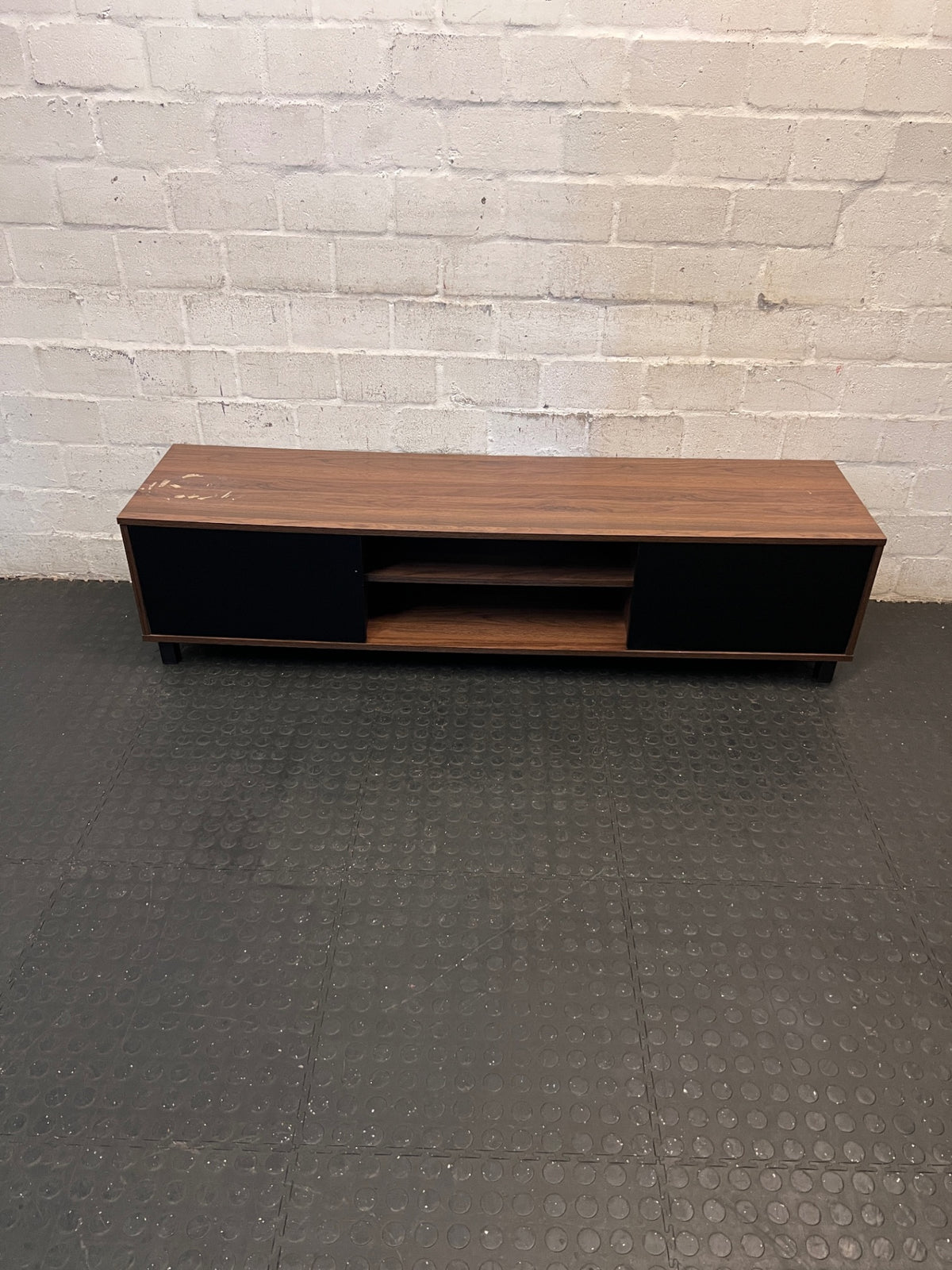 Brown and Black Low-Profile TV Unit — Surface Marks and Peeling on Top – main front view