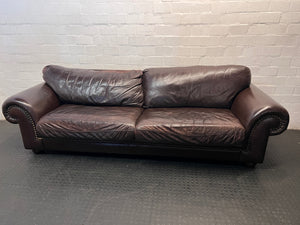 Coricraft Brown Leather 3 Seater Couch with Stud Detail — Broken Cushion Zip and Visible Leather Wear – main front view