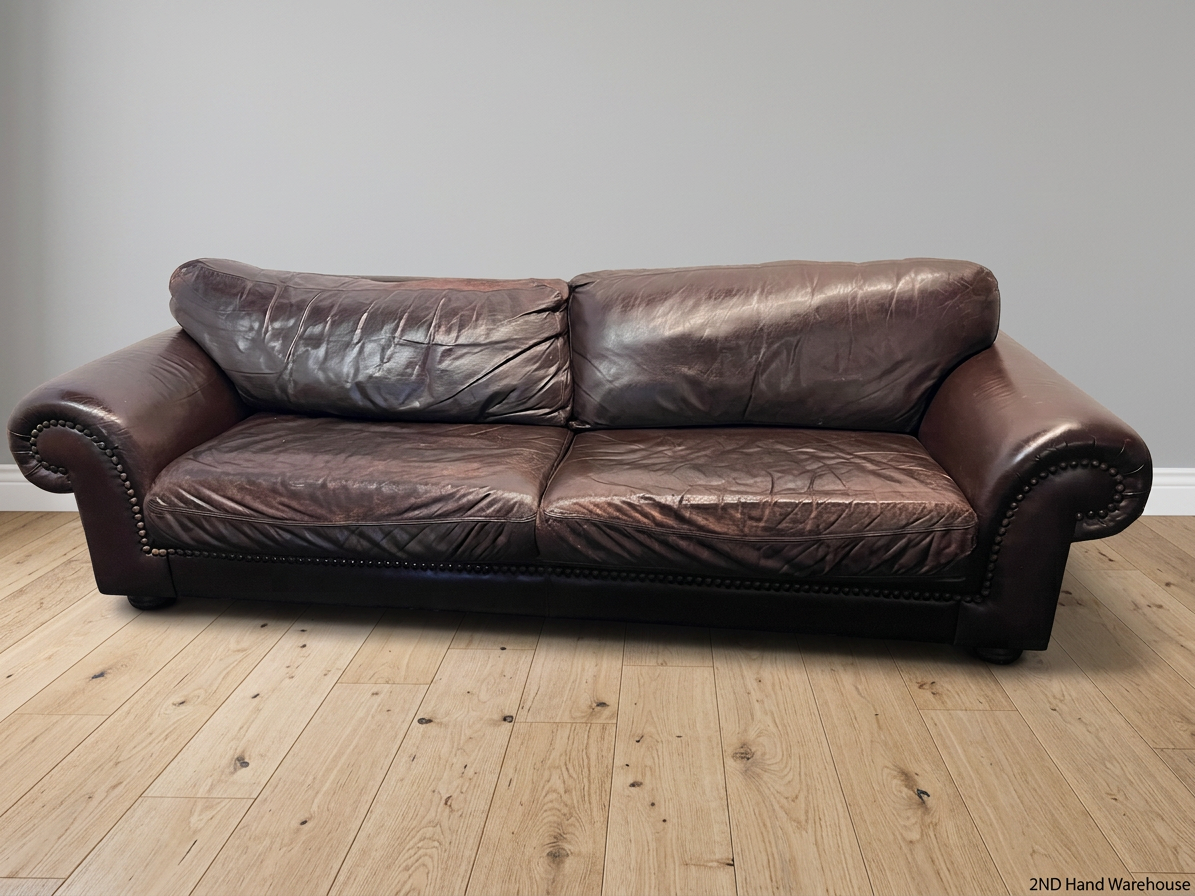 Coricraft Brown Leather 3 Seater Couch with Stud Detail — Broken Cushion Zip and Visible Leather Wear – styled product image